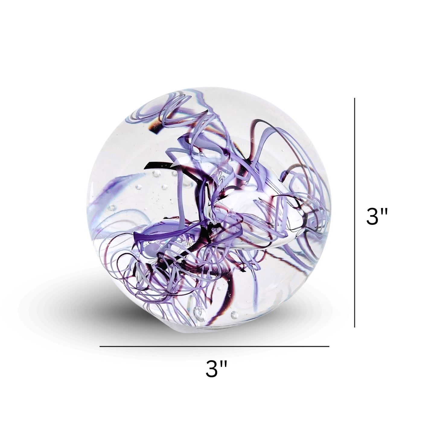3 inch round lavender and brown glass paperweight