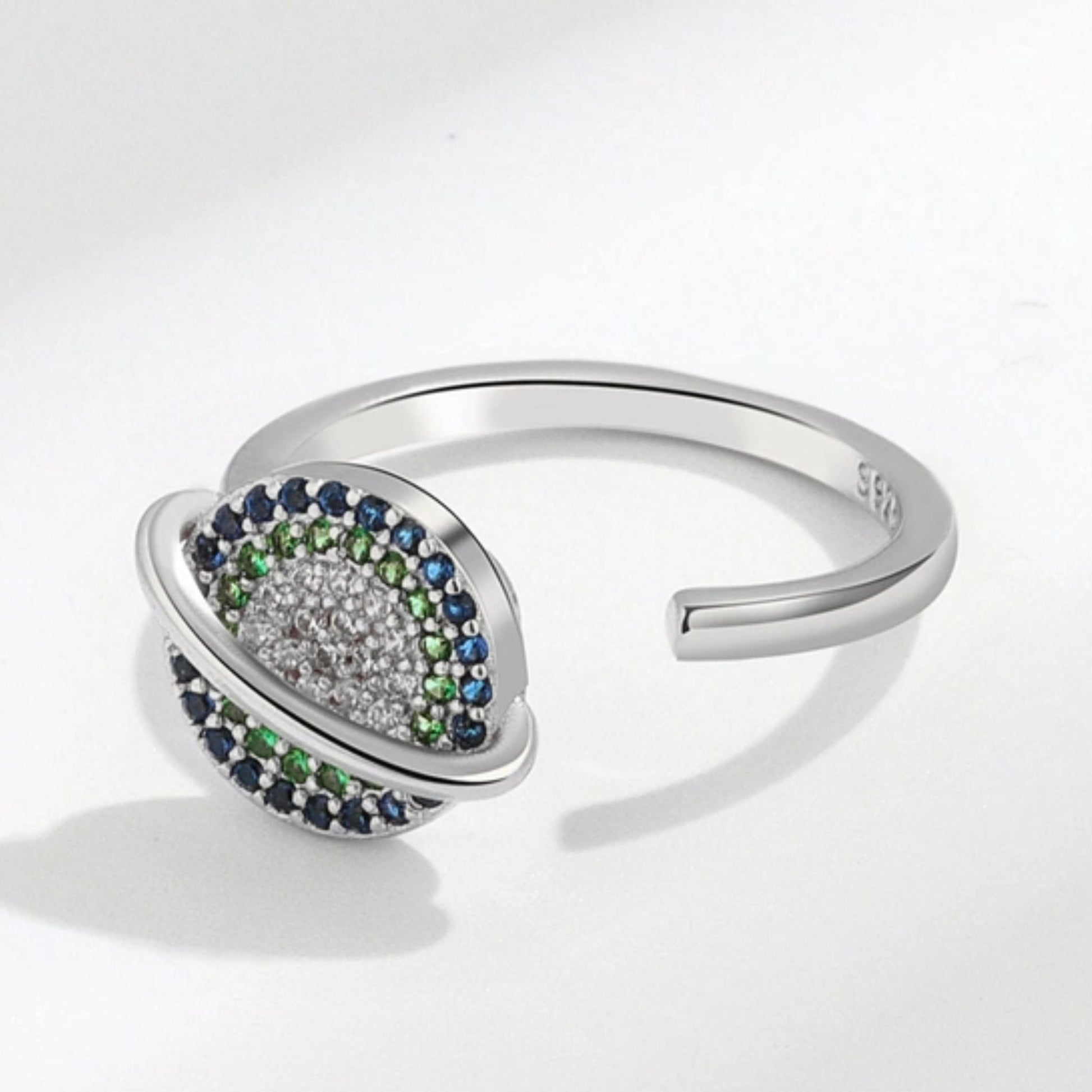 Saturn Anxiety Spinner Ring in Silver with Green and Blue Gems